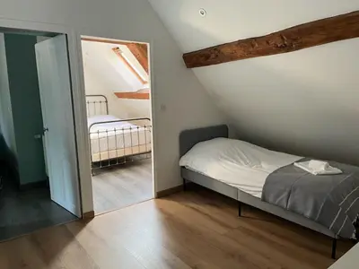 Un ou plusieurs lits dans un hébergement de l'établissement La Maison de Zoé