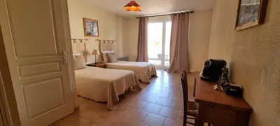 Un ou plusieurs lits dans un hébergement de l'établissement Domaine de la Courbe Hôtel & Spa