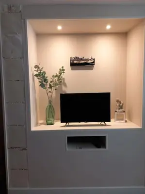 Télévision ou salle de divertissement dans l'établissement Le naturel d'Amboise