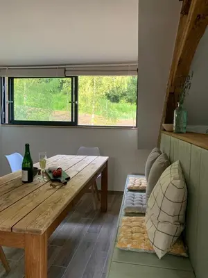 Coin salon dans l'établissement Gîte de la Forge, le Grenier