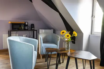 Cuisine ou kitchenette dans l'établissement La Suite Rubis