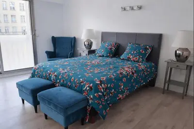 Un ou plusieurs lits dans un hébergement de l'établissement Appartement lumineux 180 m2 - 4 chambres -Hypercentre - proximité tramway