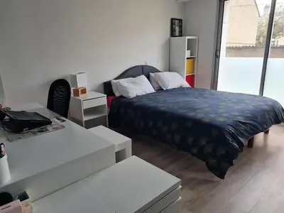 Un ou plusieurs lits dans un hébergement de l'établissement Appartement lumineux 180 m2 - 4 chambres -Hypercentre - proximité tramway