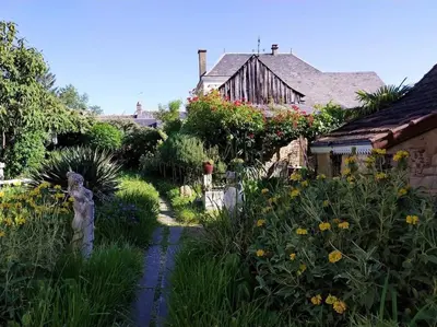 Jardin de l'établissement Le Jardin Yuccas - Cosy cottage in the Loir& Loire Valleys