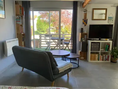 Coin salon dans l'établissement Maison d’hôtes accès piscine