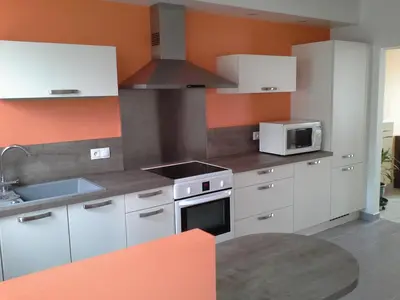 Cuisine ou kitchenette dans l'établissement Location Duverger
