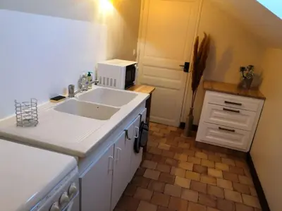 Cuisine ou kitchenette dans l'établissement Studio proche zoo de la Flèche