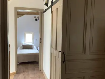 Un ou plusieurs lits dans un hébergement de l'établissement Gîte de charme avec jardin au cœur des châteaux, WiFi, parking inclus - FR-1-381-543