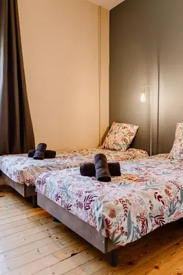 Un ou plusieurs lits dans un hébergement de l'établissement Maison Madeleine