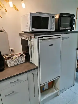 Cuisine ou kitchenette dans l'établissement La dépendance, petite maison au calme 1Chambre