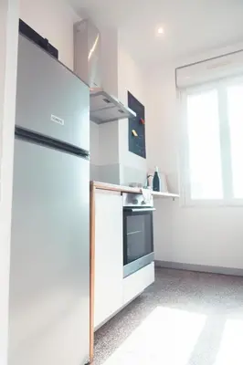 Cuisine ou kitchenette dans l'établissement Le Gamay Appartement 6 personnes