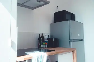 Cuisine ou kitchenette dans l'établissement Le Chenin T2 pour 4 personnes