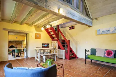 Coin salon dans l'établissement Gîte Les Toisnières