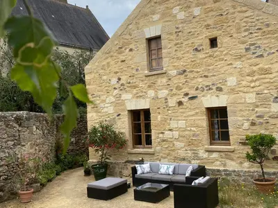Coin salon dans l'établissement Évasion Romantique au Prieuré avec Jardin en Anjou, Petit-Déjeuner Inclus - FR-1-622-63