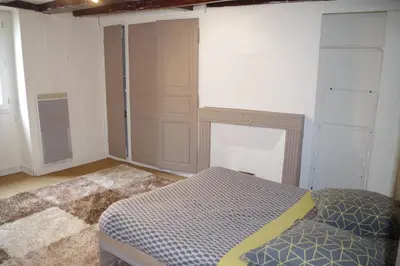 Un ou plusieurs lits dans un hébergement de l'établissement Au pied du donjon