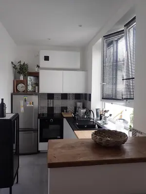 Cuisine ou kitchenette dans l'établissement Appartement tempéré avec terrasse