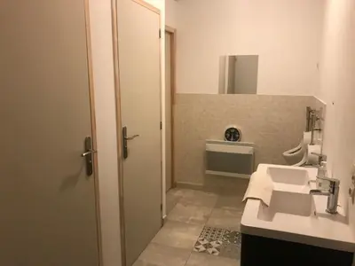 Salle de bains dans l'établissement Le Moulin de Crampaux