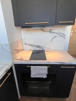 Cuisine ou kitchenette dans l'établissement Appartement T2 proche des prébendes