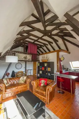Coin salon dans l'établissement Appartement de caractère au cœur du vieux Tours