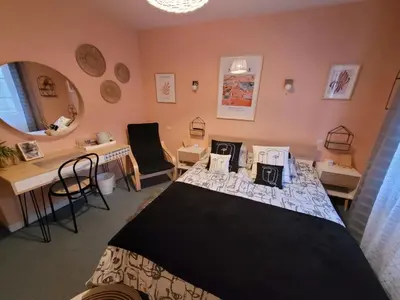 Un ou plusieurs lits dans un hébergement de l'établissement Le Relais du Chateau