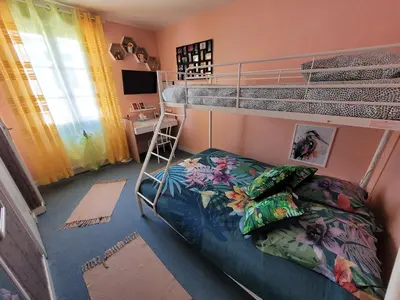 Un ou plusieurs lits dans un hébergement de l'établissement Le Relais du Chateau