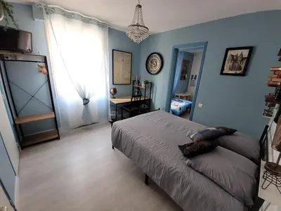 Un ou plusieurs lits dans un hébergement de l'établissement Le Relais du Chateau