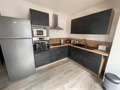 Cuisine ou kitchenette dans l'établissement Gîte Le Ballandeau