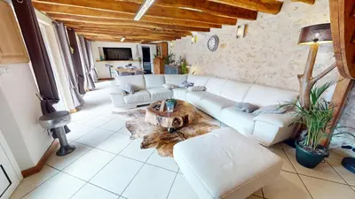 Coin salon dans l'établissement Maison 4 chambres coup de cœur