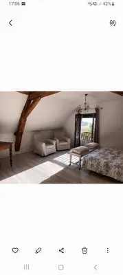 Un ou plusieurs lits dans un hébergement de l'établissement La chouett'chambre
