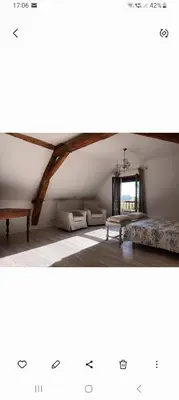 Un ou plusieurs lits dans un hébergement de l'établissement La chouett'chambre