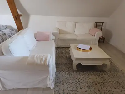 Un ou plusieurs lits dans un hébergement de l'établissement La chouett'chambre