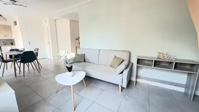 Coin salon dans l'établissement Appartement Duplex Cosy avec place de parking privée