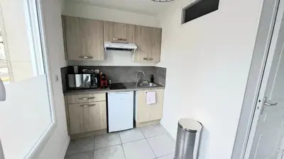 Cuisine ou kitchenette dans l'établissement Appartement Duplex Cosy avec place de parking privée