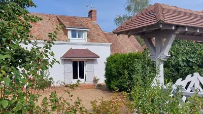 Jardin de l'établissement Cottage de 13 personnes proche du Mans