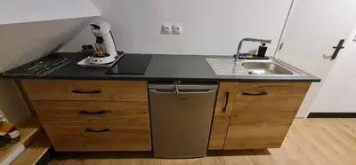 Cuisine ou kitchenette dans l'établissement Chez Julie