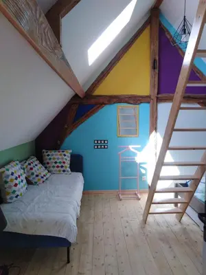 Un ou plusieurs lits dans un hébergement de l'établissement Gîte mon p'ti bout