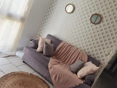 Coin salon dans l'établissement Agréable T1 bis en bord de Loire