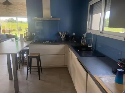 Cuisine ou kitchenette dans l'établissement Maison au calme