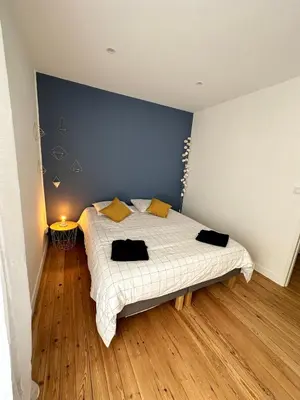 Un ou plusieurs lits dans un hébergement de l'établissement Appartement cosy et moderne - 2 Chambres