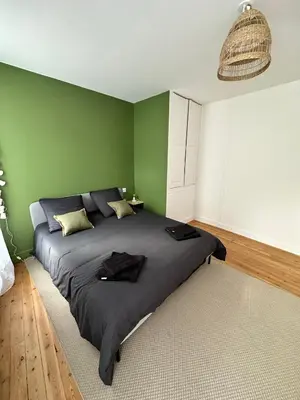Un ou plusieurs lits dans un hébergement de l'établissement Appartement cosy et moderne - 2 Chambres