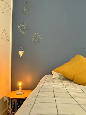 Un ou plusieurs lits dans un hébergement de l'établissement Appartement cosy et moderne - 2 Chambres