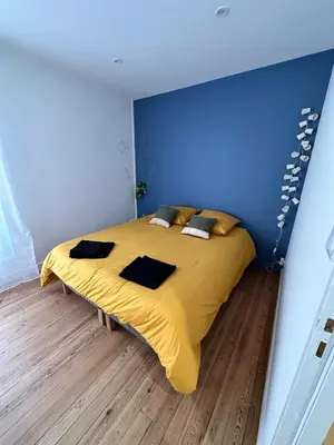 Un ou plusieurs lits dans un hébergement de l'établissement Appartement cosy et moderne - 2 Chambres