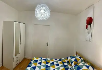 Un ou plusieurs lits dans un hébergement de l'établissement Apartment T2 Le Mans TGV Station