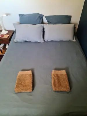 Un ou plusieurs lits dans un hébergement de l'établissement La chambre du bosquet
