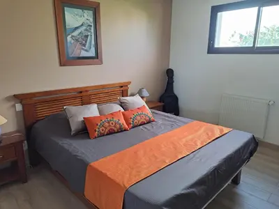Un ou plusieurs lits dans un hébergement de l'établissement chambre d'hote dans villa avec piscine