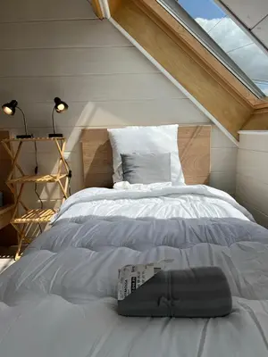 Un ou plusieurs lits dans un hébergement de l'établissement Gîte L'Arche - Maison familiale 7 pers avec jacuzzi privatif entre Blois et Amboise