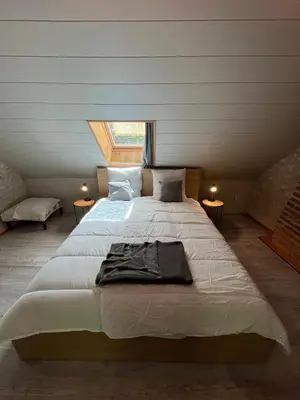 Un ou plusieurs lits dans un hébergement de l'établissement Gîte L'Arche - Maison familiale 7 pers avec jacuzzi privatif entre Blois et Amboise