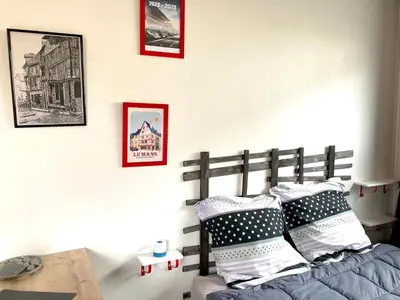 Un ou plusieurs lits dans un hébergement de l'établissement Studio atypique Le Mans