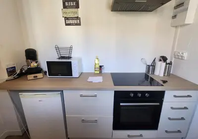 Cuisine ou kitchenette dans l'établissement L'Etape Tourangelle