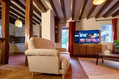 Télévision ou salle de divertissement dans l'établissement Le Haut Bois - à 5min du Zoo et centre-ville